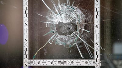 A bullet hole in the a window of a doner kebab restaurant near the synagogue in Halle. AFP