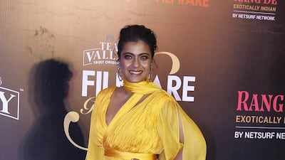 Kajol chose a Kuwaiti designer for the Filmfare Glamour awards: this bold yellow dress is by La Bourjoisie. AFP
