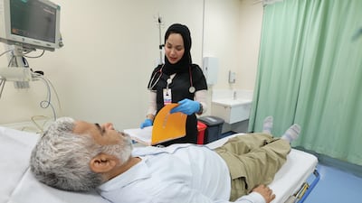 Dr Al Nuaimi monitors a patient at Sheikh Khalifa Medical City
