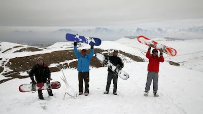 Ahmad Sorush, 22, left, Nizaruddin Alizada, 20, Karim Faizi, 24, and Mohammad Farzad, 20, are members of the Afghanistan Snowboarding Federation. AP