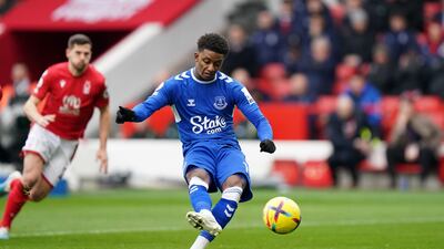 Everton's Demarai Gray scores their first goal from the penalty spot. PA