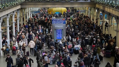 People stranded at St Pancras International station in London earlier in the day. Reuters
