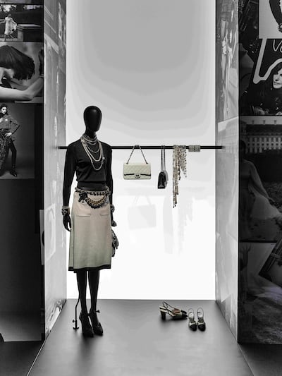 There is a space in the show dedicated to Chanel accessories, such as quilted bags, two-tone shoes and multiple strands of costume jewellery. Photo: Chanel