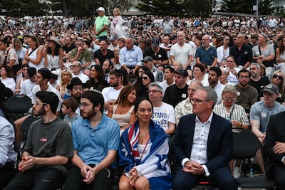 Mourners gathered at Bondi Beach a week on from Australia's worst gun rampage this century. AFP