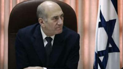 Israeli Prime Minister Ehud Olmert attends a meeting of his Kadima party yesterday.