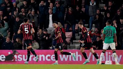 Bournemouth's Dominic Solanke, centre, celebrates after scoring their second goal. PA