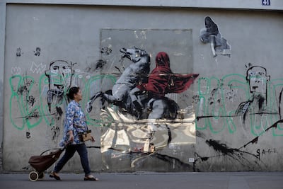 Red Horseman appeared in Paris on World Refugee Day on June 20, 2018. AFP
