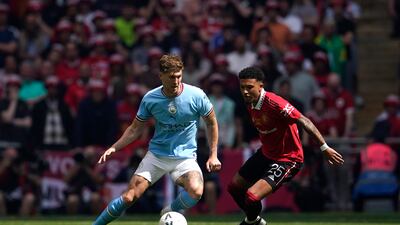 Jadon Sancho - 5: Played as a central striker at times and had a couple of half-chances and encouraging runs as he tried to weave through City, though it was difficult against Walker and Rodri. Booed by fans of his former club when he came off late in game. AP