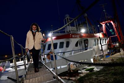 A bailiff leaves the British trawler detained in Le Havre's harbour, northern France last week. The British boat's detention comes amid a flare-up in Britain and France's ongoing dispute over fishing rights. AFP