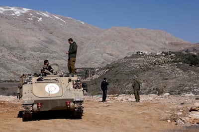 Israeli soldiers in the buffer zone that separates Israel and Syria. AFP