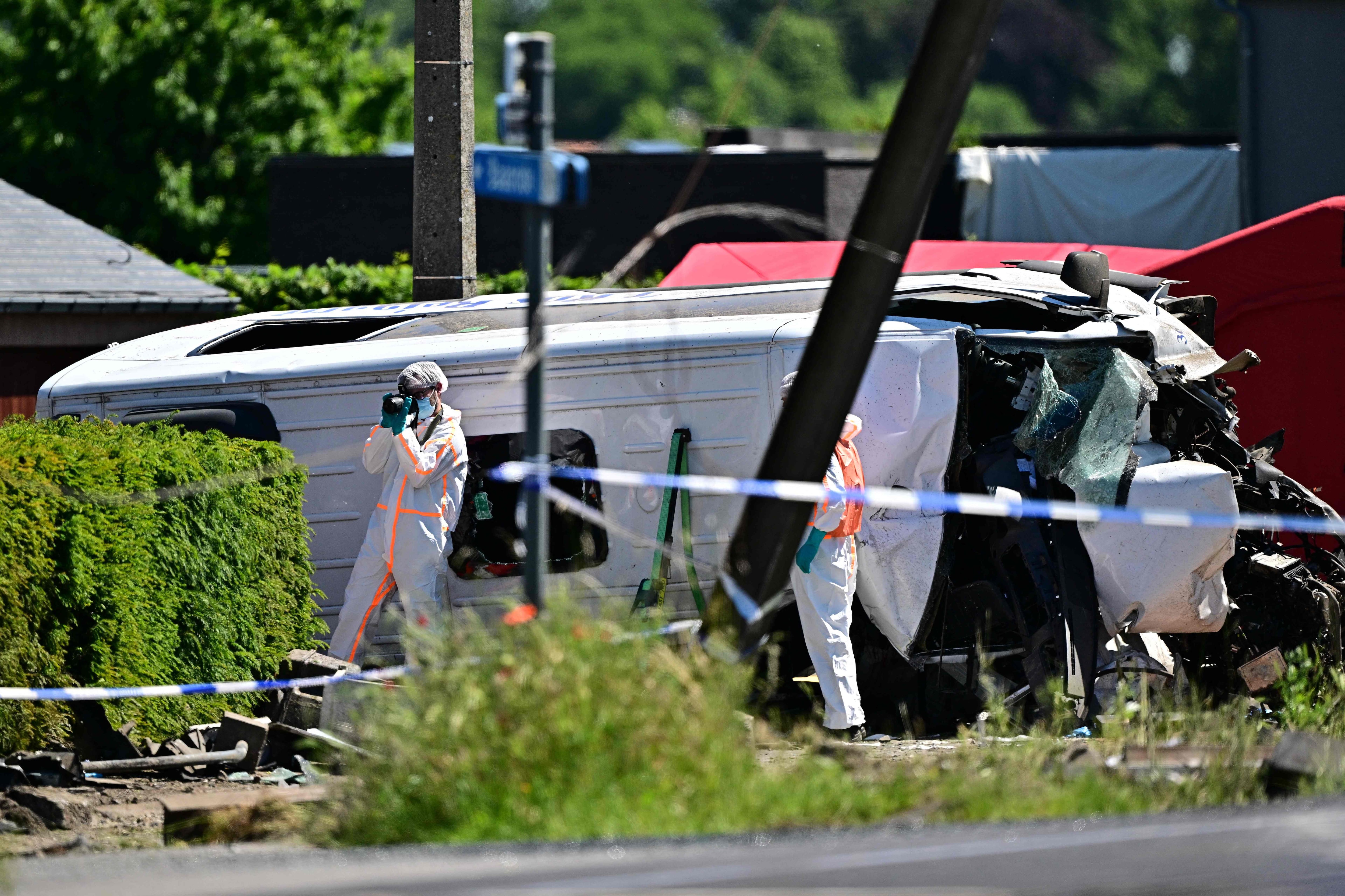 Four dead after train collides with school bus in Belgium | The National