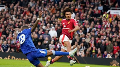 Everton's Ashley Young cannot stop Joshua Zirkzee making it 4-0 to United. AP