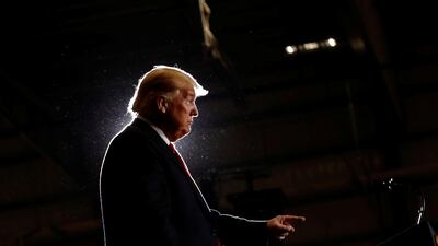 Donald Trump reacts after delivering remarks at a campaign rally at Pensacola International Airport in Florida. Reuters