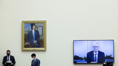 Apple CEO Tim Cook speaks via video conference. AP