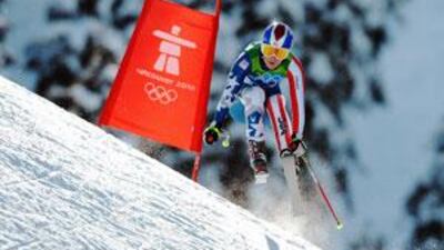 America's Lindsey Vonn, whose participation had been threatened by injury, hurtles downhill to Olympic gold at Whistler.