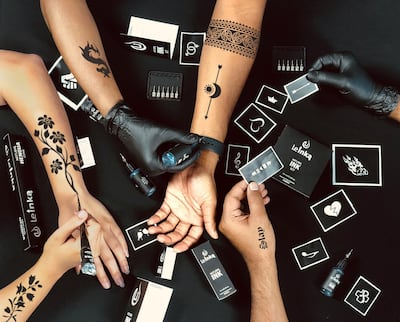 Customers can draw temporary tattos on themselves, use one of the readymade stencils available or have a custom-made stencil. Courtesy Le Inka