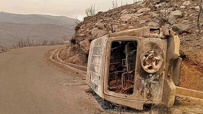 This handout picture released on the Facebook page of Radio Soummam Bejaia on July 24, 2023 shows the aftermath of Algeria's wildfires in Toudja town as temperatures hit 48 degrees Celsius (118 Fahrenheit). Wildfires raging across Algeria during a blistering heatwave have killed at least 15 people and forced mass evacuations, the government said. (Photo by Handout / Facebook Page of Radio Soummam Bejaia / AFP) / === RESTRICTED TO EDITORIAL USE - MANDATORY CREDIT "AFP PHOTO / HO / RADIO SOUMMAM BEJAIA" - NO MARKETING NO ADVERTISING CAMPAIGNS - DISTRIBUTED AS A SERVICE TO CLIENTS ===
