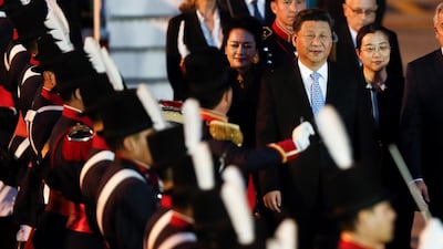 Chinese President Xi Jinping and First Lady Peng Liyuan arrive at the Ezeiza International Airport on Thursday. EPA