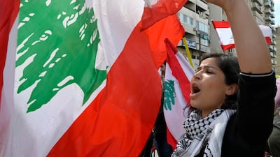 epa08398899 A protester shouts slogans during a protest at Al Nour Square in Tripoli, northern Lebanon, 03 May 2020. Anti-government protesters from across Lebanon arrived in the Lebanese city of Tripoli to show support of demonstrators of the city after the alleged death of a protester Fawaz Al Samman in clashes with the Lebanese army on 28 April 2020. EPA/WAEL HAMZEH