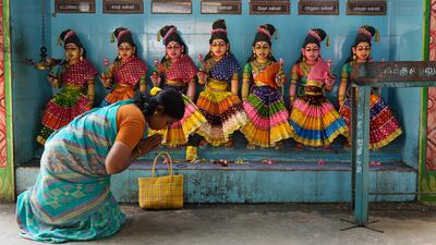 A villager in the ancestral home of US Democratic presidential nominee Kamala Harris prays for her victory at the Sri Dharmasastha temple, in Thulasendrapuram, Tamil Nadu, India. AP Photo