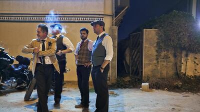 Four of the more than sixty plus Gentleman who met for the start of the Distinguished Gentleman’s Ride 2014 in Dubai enjoy a smoke and a ‘chin-wag’ before the start of the ride.