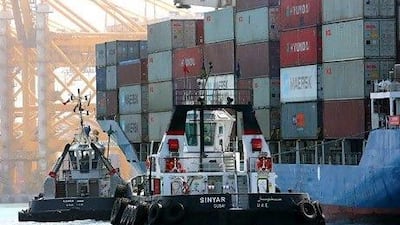 The flow of goods in and out of the UAE surged 25 per cent to a record high of Dh1 trillion last year. Pawan Singh / The National