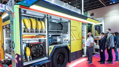 This fully electric municipal fire engine features amongst other aspects a Volvo Penta electric drivetrain, drive power of dual engines producing 350 kW, a diesel-powered BMW Range Extender, two high-voltage batteries with 100 kWh of available capacity and an electronic stability programme with additional rear axle steering (all-wheel steering) for optimised manoeuvrability. Antonie Robertson / The National