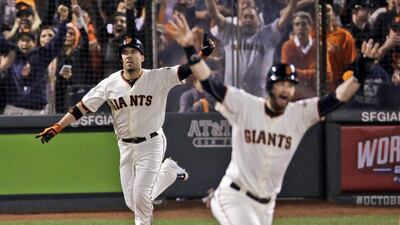 San Francisco Giants Travis Ishikawa reacts after hitting a walk-off three-run home run during the ninth inning of Game 5 of the National League baseball championship series against the St. Louis Cardinals Thursday, Oct. 16, 2014, in San Francisco. The Giants won 6-3 to advance to the World Series. AP Photo/Jeff Chiu