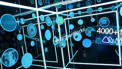 Logos of different cryptocurrencies are displayed during the Token2049 conference in Dubai on April 30, 2025. (Photo by Giuseppe CACACE / AFP)