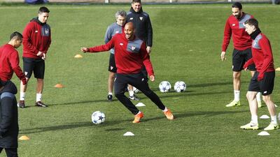 Sevilla players go through their paces ahead of Wednesday's Uefa Champions League last-16 first-leg match against Leicester City. Julio Munoz / EPA