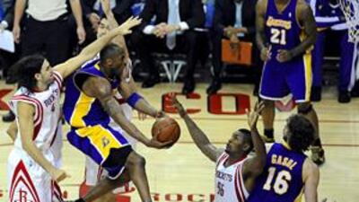 LA's Kobe Bryant, with the ball, scored at crucial times.