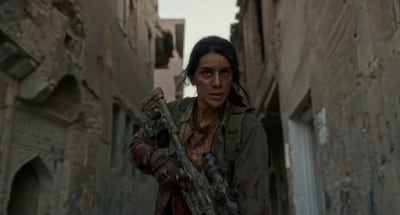Avan Jamal stars as Vyan, a Kurdish sniper searching for her missing sister, in No Paradise If You Are Killed by a Woman. Photo: Hene Films