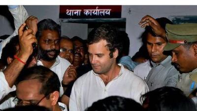 Rahul Gandhi walks out of Kasna police station on his release after he was arrested for joining a protest by farmers over alleged inadequate compensation from a state government for land bought to build a highway on the outskirts of the Indian capital.