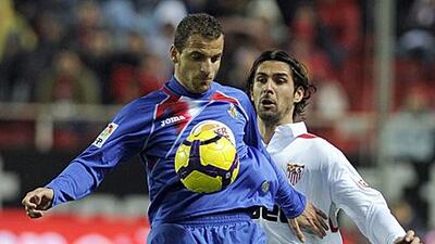 Roberto Soldado shields the ball from a Sevilla defender in a Copa del Rey match last month.