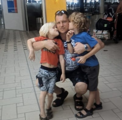 Dubai resident Robert Pether with his sons in happier times before his incarceration. Photo: Desree Pether
