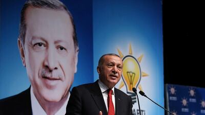 Turkish President Tayyip Erdogan addresses members of his ruling AK Party in Rize on August 11, 2018. Presidential Palace via Reuters