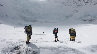 Long lines of climbers caused congestion on the ropes between Camp 2 and 3. Courtesy UAE Armed Forces