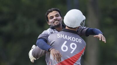UAE bowler Nasir Aziz, left, will probably not play in the World Cup Qualifier in New Zealand. Chris Young / The National