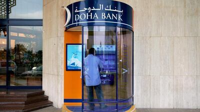 Moody's on Tuesday slashed the long-term deposit ratings of both Doha Bank and Commercial Bank of Qatar. Ryan Carter / The National