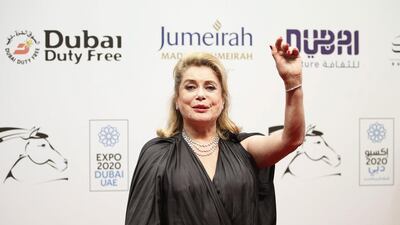 Catherine Deneuve, who was presented a lifetime achievement award, arrives at the opening ceremony of the Dubai International Film Festival. EPA / Ali Haider