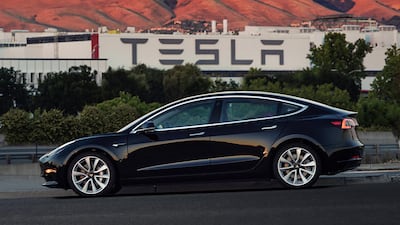 Tesla pushed back a production target for its Model 3 again after shipping fewer of the sedans than expected. Courtesy of Tesla Motors via AP.