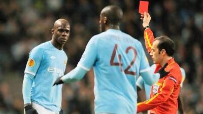 Manchester City's Mario Balotelli missed 11 games last season through suspensions. Andrew Yates / AFP