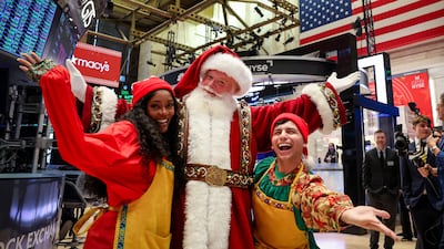 Macy's Santa Claus visits the New York Stock Exchange. Christmas appeared to come early this year, with the S&P 500 index jumping 5.7 per cent in November. Reuters