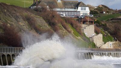 Waves crash during strong winds in Folkestone, south-east England. AP