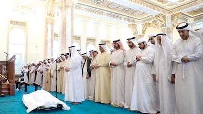 Sheikh Humaid bin Rashid Al Nuaimi, Ruler of Ajman, and Sheikh Saud bin Saqr Al Qasimi, Ruler of Ras Al Khaimah, perform funeral prayers for Sheikha Hamda at Al Shuhada Mosque in Dubai on Saturday. Wam