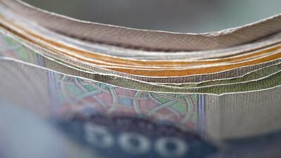 The Central Bank of the UAE has banned seven exchange houses from carrying out any transactions related to remittances or wage payments. Silvia Razgova / The National