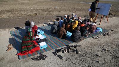 Afghan children take a class in open due to lack of school and facilities in Laghman. EPA