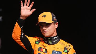 McLaren driver Lando Norris celebrates clinching pole position at the Belgian Grand Prix. PA