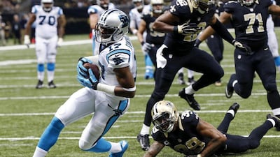 Carolina Panthers wide receiver Devin Funchess (17) scores a touchdown in front of New Orleans Saints cornerback Brandon Browner (39), New Orleans Saints linebacker James Anderson (42) and defensive tackle Kaleb Eulls (71) in the second half of an NFL football game in New Orleans, Sunday, Dec. 6, 2015. (AP Photo/Bill Feig)
