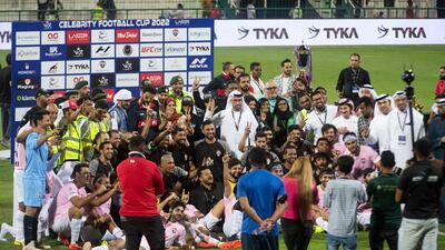 The teams are all smiles.